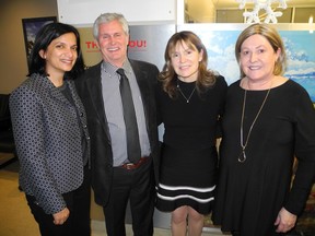 Pictured, from left, at the Calgary Prostate Cancer Centre Jingle Bell Mingle  at the centre are PCC board members Nipa Chakravarti, David Ferguson, Dr. Shelley Spaner and PCC executive director Pam Heard.