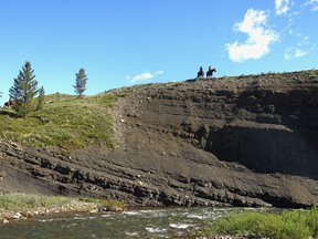 Ranchers on a ridge above the Livingstone River where it flows near Cabin Ridge, site of a proposed coal mine north of Coleman, Alberta.