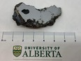 A sample of the El Ali meteorite found in Somalia. Scientists at the University of Alberta helped identify two new minerals while classifying the meteorite.