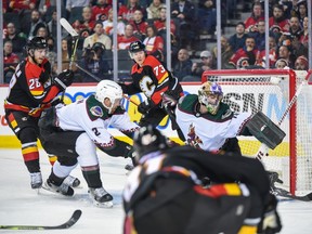 Calgary Flames forward Nazem Kadri scores against Arizona Coyotes goaltender Karel Vejmelka at Scotiabank Saddledome in Calgary on Monday, Dec. 5, 2022.
