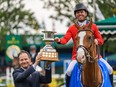 Kent Farrington, riding Creedance, celebrates his ATCO Cup victory during Spruce Meadows’ Masters tournament on Thursday, Sept. 8, 2022.