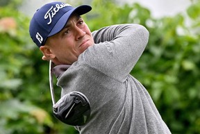U.S. golfer Justin Thomas plays his shot from the ninth tee during the first round of the RBC Canadian Open at St. George's Golf and Country Club on Thursday in Etobicoke, Ontario.