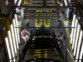 Industrial policy is back in vogue in push for Canada to win on green economy - google news - Finance - Public News Time Workers at an auto parts manufacturing facility in Guelph, Ont.