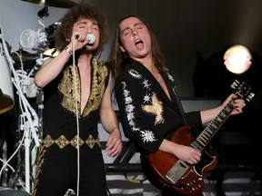 Greta Van Fleet singer Josh Kiska (left) and twin guitarist Jake Kiska perform at Allegiant Stadium in Las Vegas on February 25, 2022.