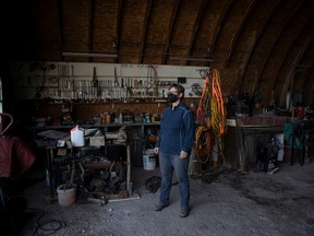Sandy Lowndes’ stands for a portrait inside one of her barns.