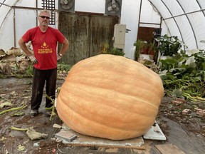 FIRST READING: It's 'entirely illegal' for China to open police stations here, says Ottawa - alberta news today That’s Alberta man Donald Crews standing next to the heaviest pumpkin in recorded Canadian history. Unveiled at the Smoky Lake Great White North Pumpkin Weigh-off this month, it came in at 2,537 pounds. That’s not all that far off the world record, which belongs to a 2,702 pound pumpkin grown last year in Italy.