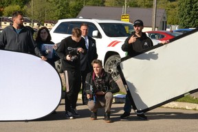 Camera operator Nickolas Murray, focal puller Declan Rintoul and director of photography Jason Lupish prepare to shoot a scene in front of the St. Marys municipal operations centre Friday morning. (Galen Simmons/The Beacon Herald)