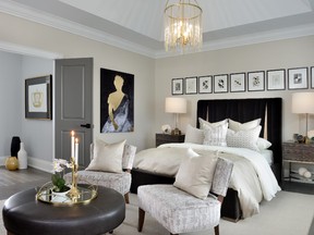 This bedroom by Jane Lockhart Design is an example of tone-on-tone colour palettes and features charcoal grey, black and white. L
