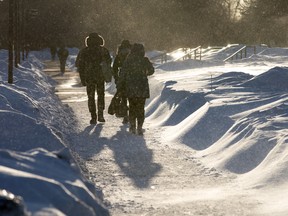 Civil servants go home at Tunney's Pasture on February 25, 2015.