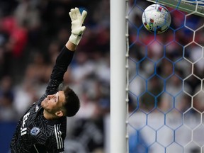 Vancouver Whitecaps goalkeeper Thomas Hassall conceded a goal to Nashville FC's Jack Maher during the first half of MLS football in Vancouver on Saturday, August 27, 2022.