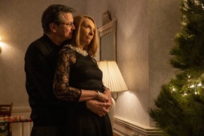 Colin Firth and Toni Collette starring on the stairs.