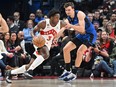 Toronto Raptors forward OG Anunoby dribbles the ball against Orlando Magic forward Franz Wagner in the first half at Scotiabank Arena.