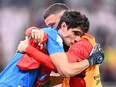 Morocco goalkeeper Yassine Bounou celebrates winning the 2022 World Cup quarterfinal football against Portugal at the Al-Thumama Stadium in Doha on December 10, 2022.