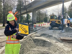 Surrey’s growth is “happening too fast. But it’s going to happen whether I like it or not,” says flagperson Tina Hernstedt, who has lived in the city since she was 13.