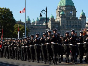 The Royal Guard of Honour lead the ceremonial procession and provincial commemorative service for Queen Elizabeth during a national day of mourning in Victoria, Monday, Sept. 19, 2022.