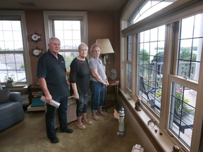 Amherstburg condominium owners Don Parks, Colleen Fox and Margaret Beaudoin are shown at the Dalhousie Street complex on Thursday, September 22, 2022. They are opposed to a boutique hotel proposed to be built just a few feet from their building.