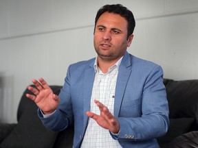 Ghousuddin Frotan discusses his journey at his Windsor residence on Thursday, Sept. 29, 2022. He and his family are among the hundreds of Afghan refugees resettled so far this year in Windsor.