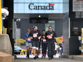 Detroit Free Press marathon runners are shown at the Windsor/Detroit tunnel area on Sunday, October 16, 2022.