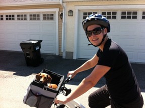 Real Life writer Theresa Tayler and Lilly the dog go for a ride