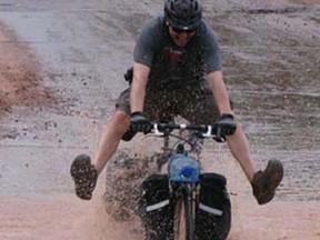 Cycling through a big puddle in Argentina.