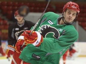 Dean Bicknell, Calgary Herald
CALGARY AB: APRIL 5, 2011--Calgary Flame Lance Bouma shots puck during the the Calgary Flames practice on Tuesday April 05, 2011 at the Max Bell Centre in Calgary in preparation for the final week of their regular season.        Dean Bicknell / Calgary Herald) For Sports story byÂ John Down  00032499A