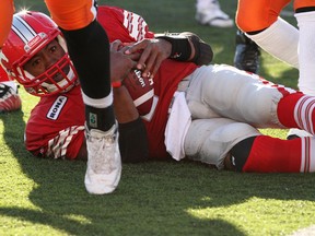 Stamps quaterback  Henry Burris slides in for some yardage against the B.C. Lions on Saturday