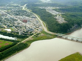 A just-opened bridge on Highway 63 into Fort McMurray will double access over the Athabasca River. This picture was taken in 2006 and shows the two old bridges which are being rebuilt.