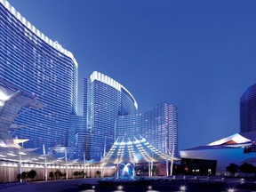 Aria Resort & Casino in Las Vegas is offering a variety of $11 appetizer and drink specials in celebration of the next "same number day" -- 11/11/11. Two of CityCenter’s water features are seen in this shot, including the multi-coloured lit fountain in the centre of the area, and the long water wall along the front of the Aria hotel.  Photo courtesy MGM.