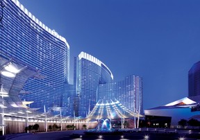 Aria Resort & Casino in Las Vegas is offering a variety of $11 appetizer and drink specials in celebration of the next "same number day" -- 11/11/11. Two of CityCenter’s water features are seen in this shot, including the multi-coloured lit fountain in the centre of the area, and the long water wall along the front of the Aria hotel.  Photo courtesy MGM.