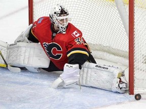 Mikka Kiprusoff does the splits to save a goal