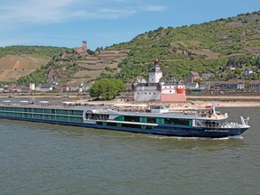 The Avalon Panorama -- a luxe and modern example of river cruise ships -- is seen here navigating down the Rhine River, where riverbanks are home to castles and vineyards. Photo courtesy Avalon Waterways.