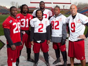 Stampeder award nominees, from left, Brandon Smith (Outstanding Defensive Player), Demetrice Morley (Outstanding Rookie), Larry Taylor (Outstanding Special Teams Player), Stanley Bryant (Outstanding Lineman), Nik Lewis (Most Outstanding Player), Jon Cornish (Outstanding Canadian). Photo, Gavin Young, Calgary Herald