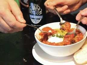 Spooning up some Steam Whistle Chili. Photo courtesy Jiggy.tv.