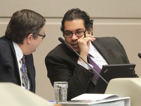 Mayor Naheed Nenshi speaks with city manager Owen Tobert during the 2010 budget talk (Colleen De Neve / Calgary Herald)