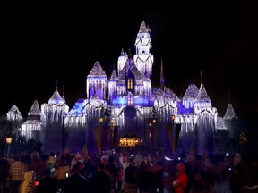 HOLIDAY MAGIC -- The holiday season finds Sleeping Beautys Winter Castle ât Disneyland covered in freshly fallen snow.