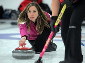 Crystal Webster combined with her husband Paul to win a mixed doubles tournament on Wednesday at the Glencoe Club. Photo, Stuart Gradon, Calgary Herald