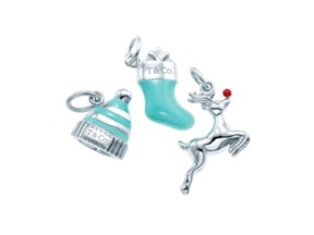 Tiffany Charms in sterling silver with Tiffany Blue® enamel finish: snow hat charm, stocking charm, reindeer charm. All photos courtesy  Tiffany & Co.