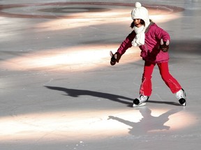 There are lots of great activities to take part in on Family Day, including skating at Olympic Plaza. Here, Gabriela Pyzik, 7, tests our her new skates at the plaza. Photo by Leah Hennel, Calgary Herald.