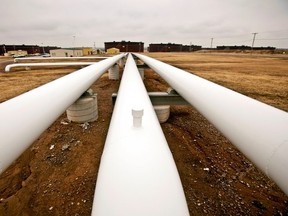 Oil pipelines and tanks at the Enbridge tank storage and pipeline facility in Cushing, Okla.