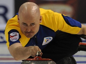 Calgary's Kevin Koe delivers a rock during his triumphant run at the 2010 Tim Hortons Brier in Halifax. Photo, Michael Burns Jr., Canadian Curling Association