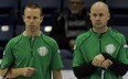 Pat Simmons, left, and Kevin Koe can start preparing for the Page playoff one-two game after their A-event final win over Kevin Martin on Thursday.