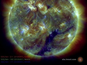 A pair of steamy explosions on the Sun's surface in recent days is sparking the biggest radiation and geomagnetic storm the Earth has experienced in five years, space weather experts said March 7.  PHOTO CREDIT: AFP PHOTO / NASA"