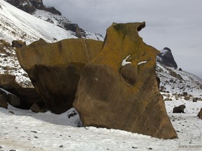 Brown Bluff, Western Antarctic Peninsula: Large boulders have toppled from Brown Bluff to the beach where they have been sculpted by wind, sand, ice and water.