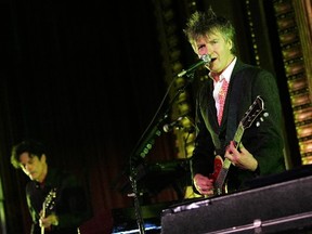 Mick Hart (L) and Neil Finn of the band Crowded House perform onstage at the Masonic Temple on July 19, 2007 in New York City