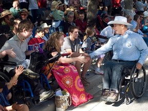 Rick Hansen, Canada's Man in Motion was the Calgary Stampede Parade Marshal last year