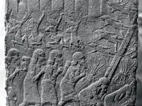 This stone relief depicts the 1971 Progressive Conservative near-sweep of Calgary in... (murmurs) I'm being told it's actually a 7th-century B.C. image of Assyrians storming a citadel, from the Metropolitan Museum in New York. Makes sense, because that doesn't look like Social Credit citadel architecture.