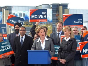 Alberta PC leader Alison Redford made a campaign announcement regarding emergency room wait times while surrounded by supporters and candidates near the new South Calgary Health Campus