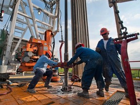 An Orion Drilling Co. crew works a drilling rig in the Eagle Ford Shale in Webb County, Texas, part of North America's tight oil bonanza. Credit: Eddie Seal/Bloomberg