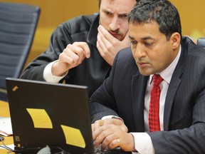 Alberta Liberal leader Raj Sherman, right, participates in an on-line leader's debate at the Calgary Herald, April 16, 2012.