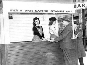 The Stamp Bar  opened in 1943 in downtown Calgary selling War Savings Stamps, Certificates and Victory Bonds to support the soldiers fighting in World War II.  The '44 Stampede had a kiosk on the grounds raising money as well. Herald File Photo.